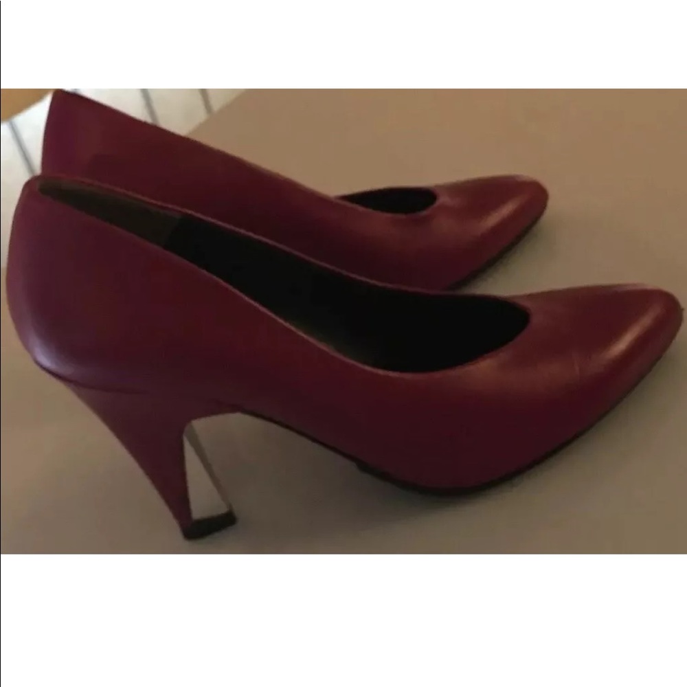 Pink pumps. By Charles Jordan